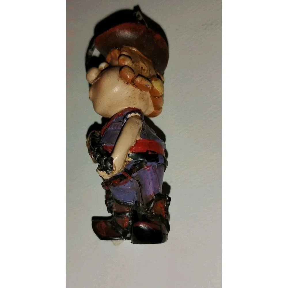 Crazy‎ Crosseyed Cowboy Keychain Figure Possible Vintage Carrying Shotgun Scar